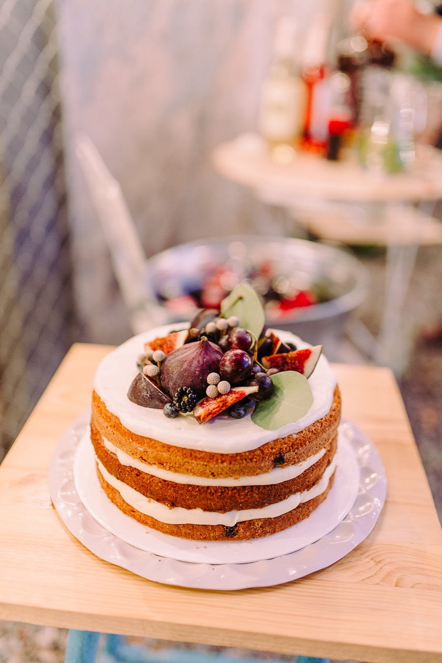 Cake table styling with desserts and floral accents